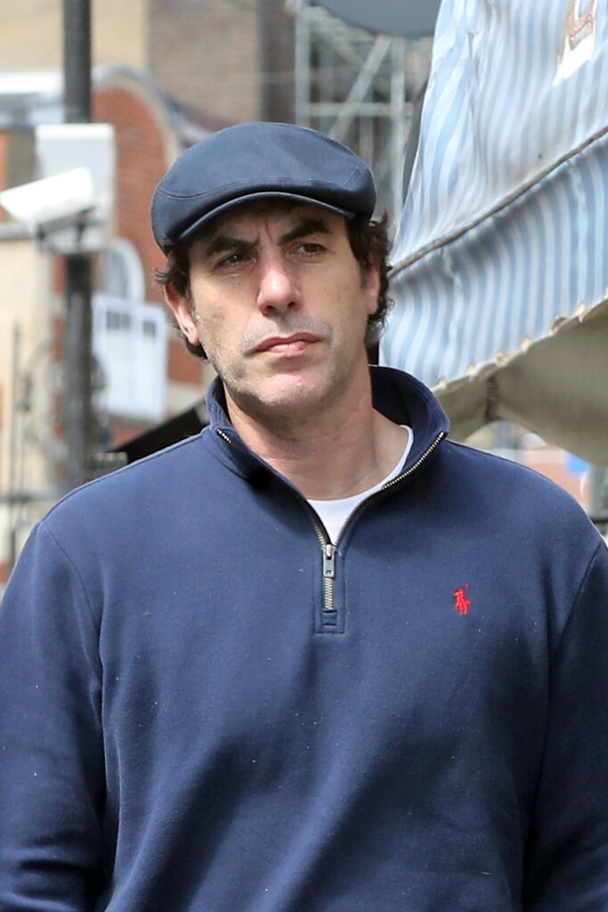 Sacha Baron Cohen has been spotted with his wedding ring back on in London