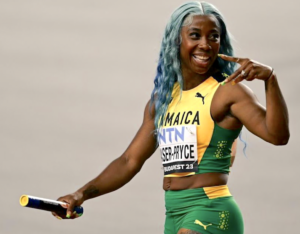 Shelly-Ann Fraser-Pryce in Two-Piece Workout Gear Says "Momentum Takes You Forward!"