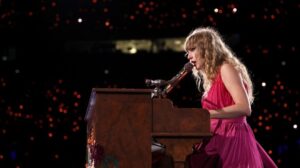 Taylor Swift Laughs About Travis Kelce While Performing