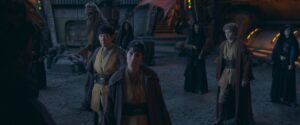 A group of Jedi standing and looking at someone in a still from The Acolyte