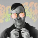 The Used's Bert McCracken Launches Solo Project Robbietheused With Vibrant Single 'Just A Little Bit'