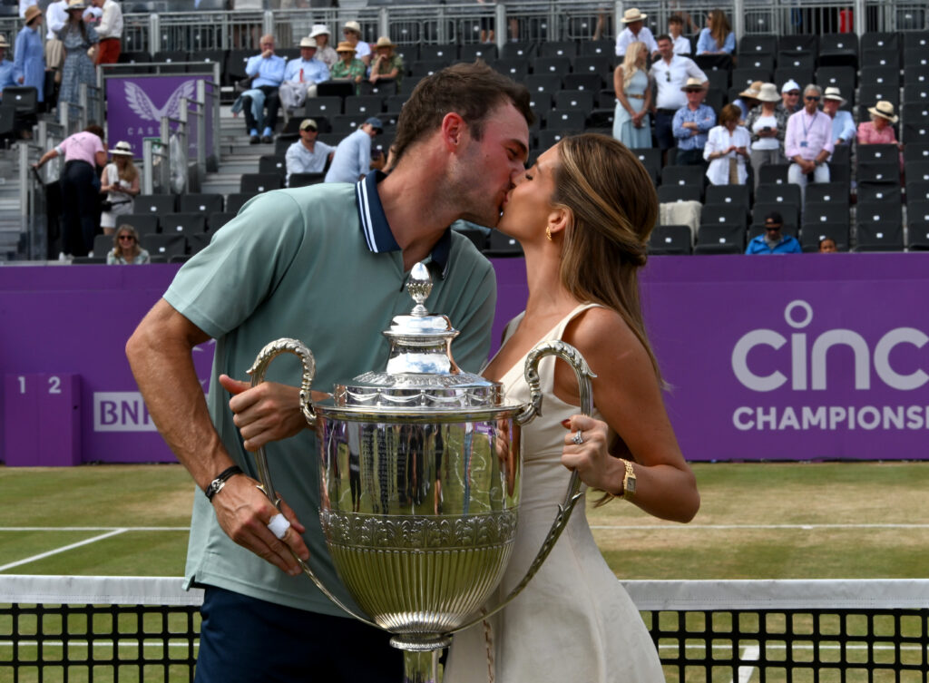 Tommy Paul celebrates with girlfriend Paige Lorenze