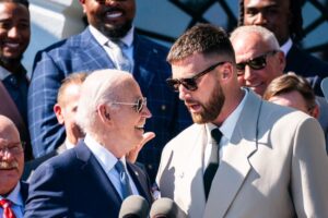 Travis Kelce spoke for mere seconds Friday and left his peers, reporters and the president laughing.