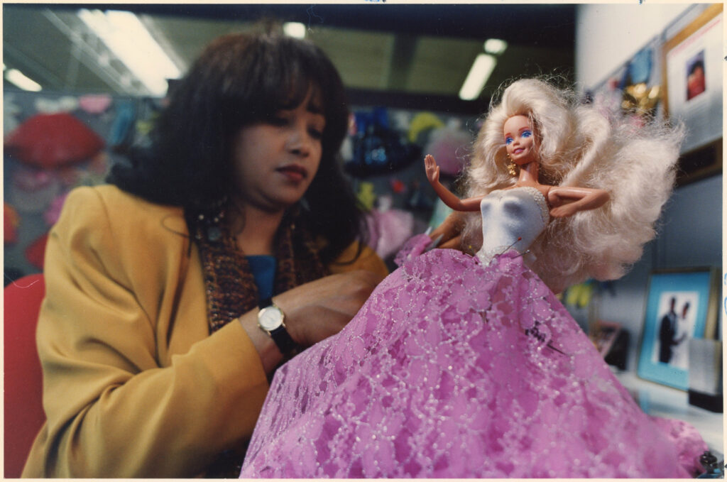Louvenia 'Kitty' Black Perkins is seen creating tiny outfits for Barbie dolls at the Mattel offices in El Segundo, California, on January 29, 1991