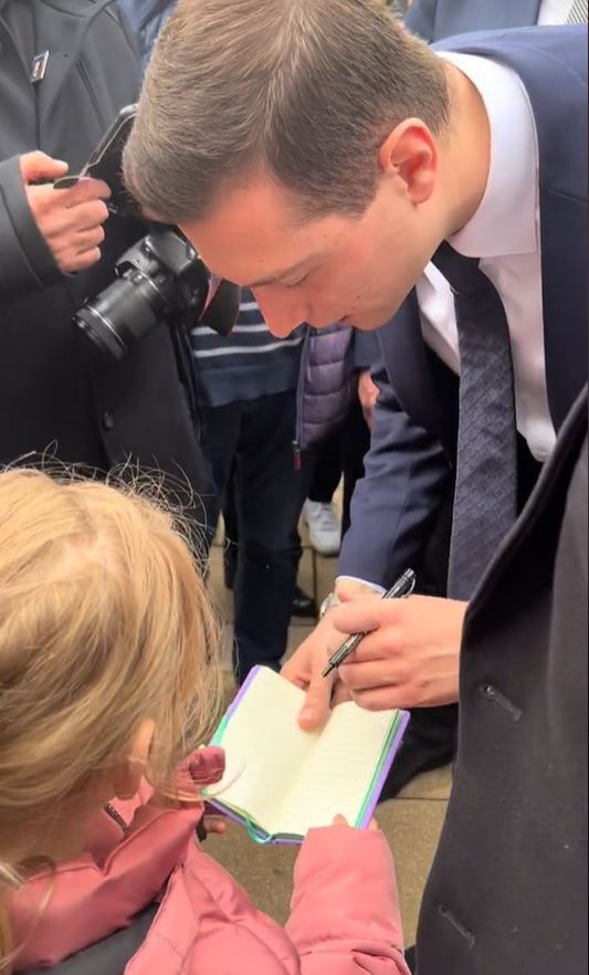 Bardella shares a video on TikTok of him signing a little girl's autograph