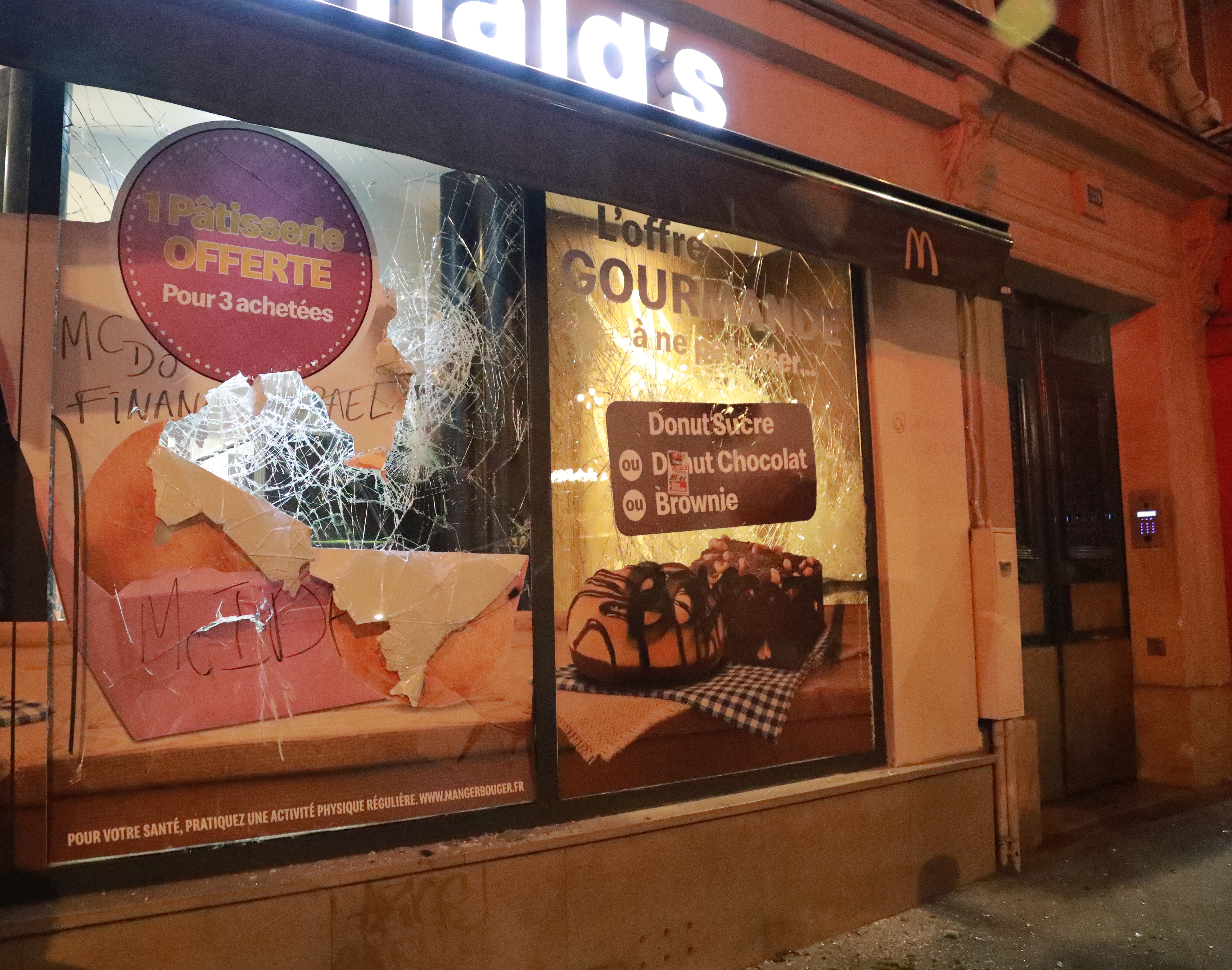 Shop windows were smashed as rioters clashed with cops