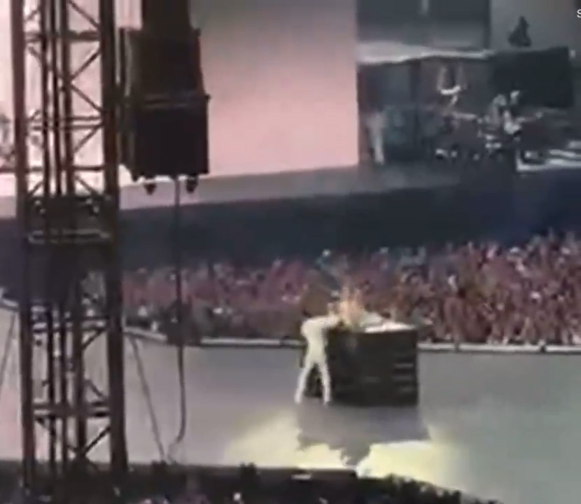 Taylor Swift's backup dancer Jan Ravnik helped her down off the elevated stage in Dublin, Ireland