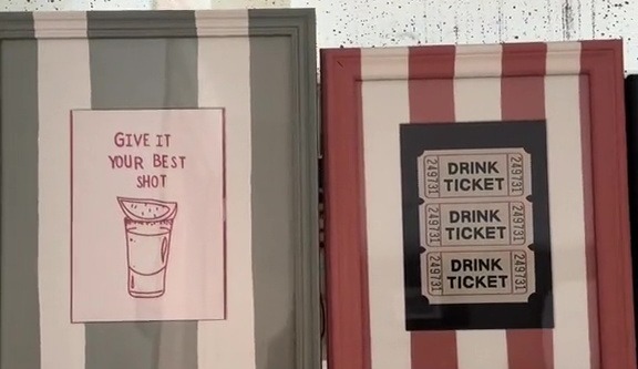 Before adding some drink-themed prints she'd bought from Etsy