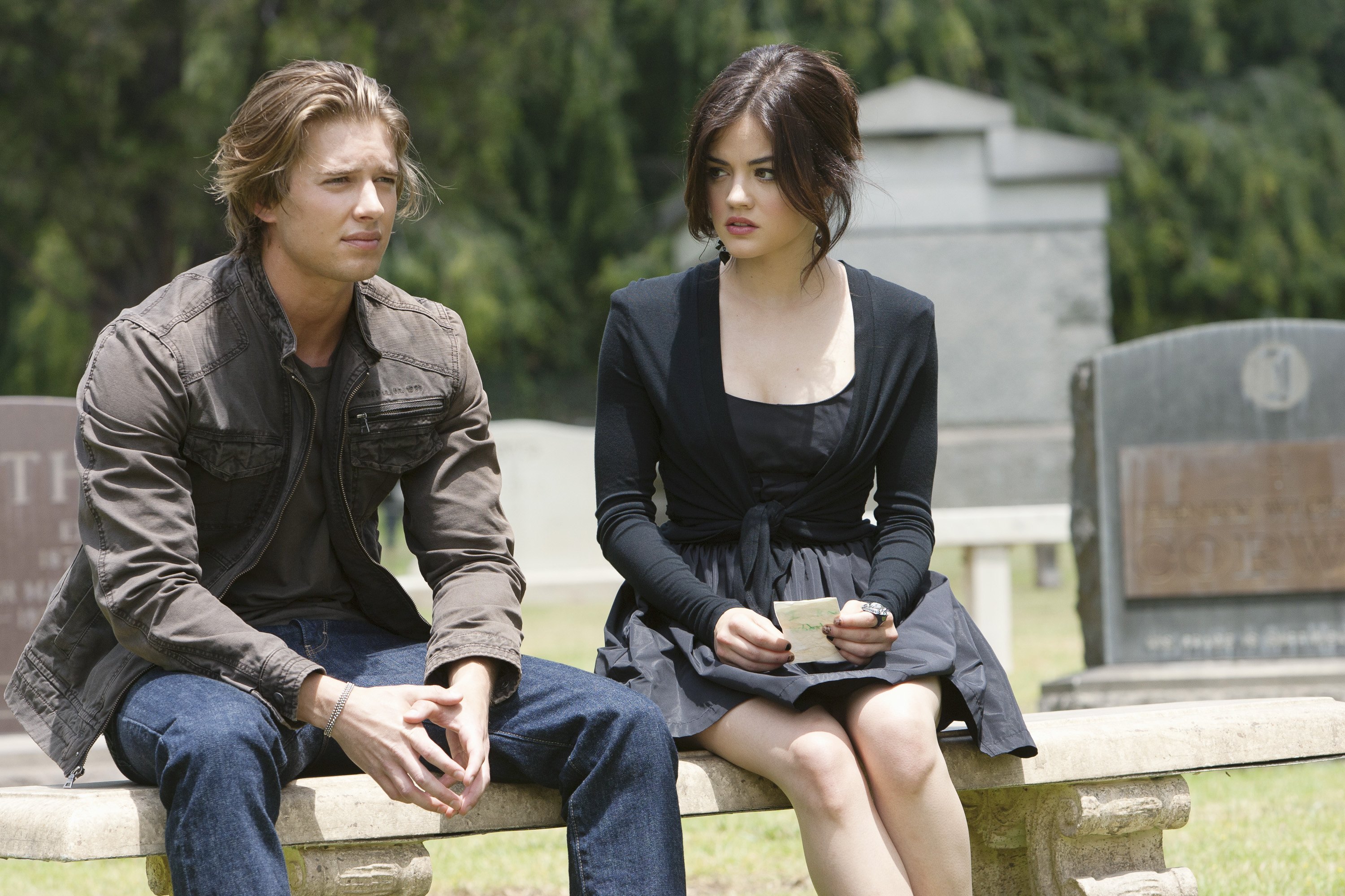 Drew Van Acker and Lucy Hale in a still from a season two episode of Pretty Little Liars