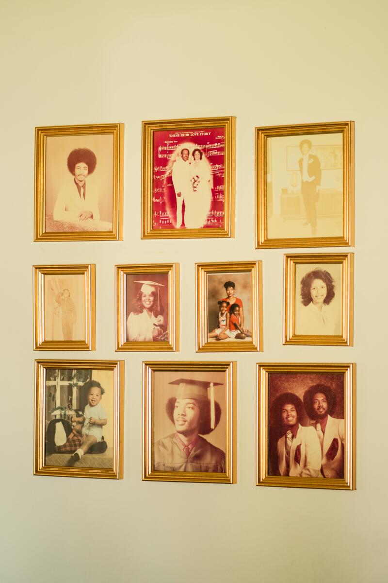 Family photos displayed on the wall.