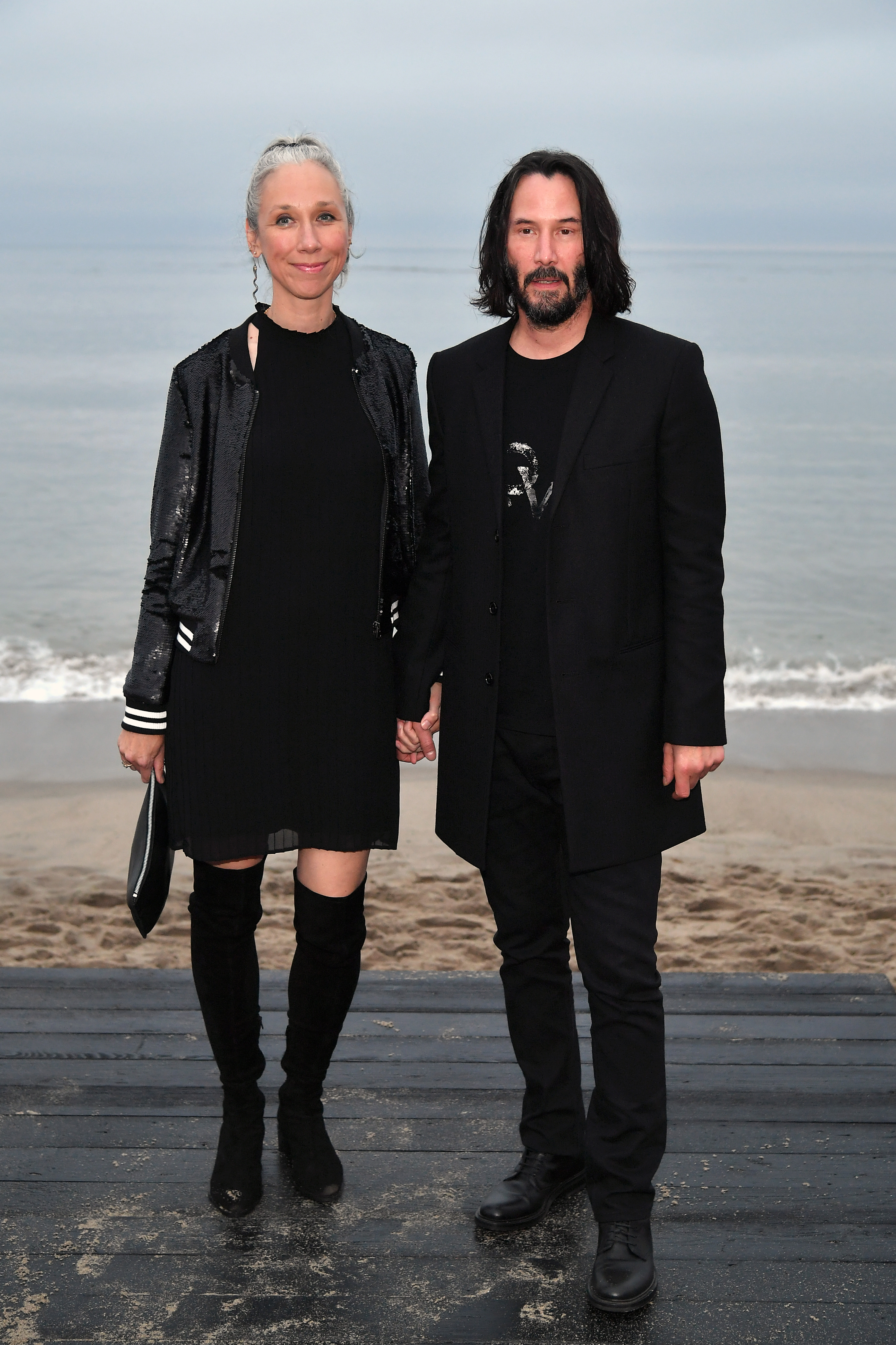 Keanu and Alexandra, seen here at the Saint Laurent Mens Spring Summer 20 Show on June 06, 2019, went public with their relationship that same year