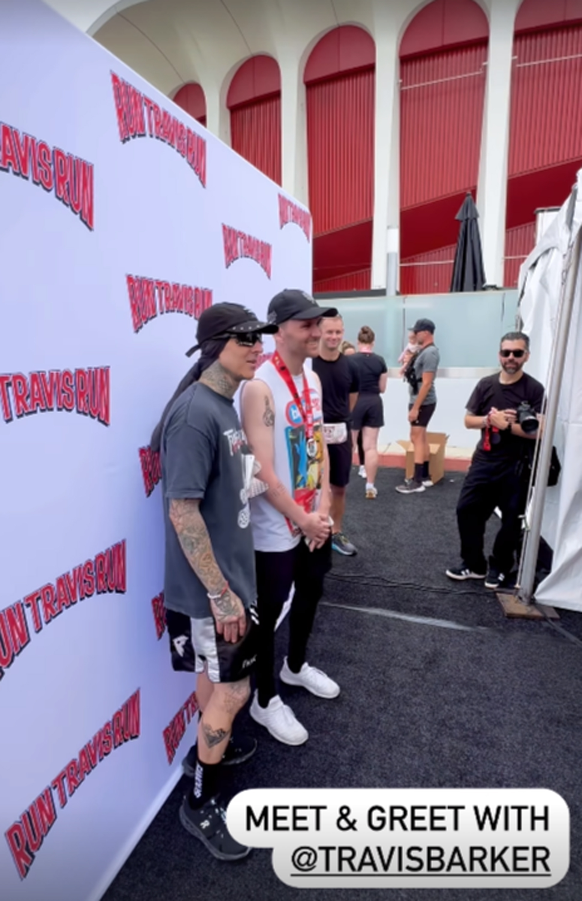 After running, fans could take a picture with Travis Barker in front of a Run Travis Run backdrop