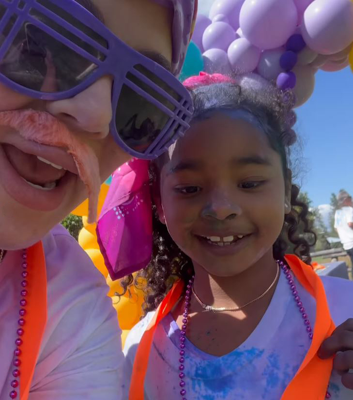 Khloe Kardashian and her daughter True Thompson celebrating that they participated in The Color Run