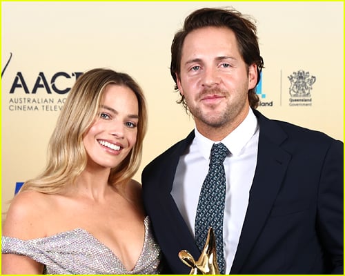 Margot Robbie and husband Tom Ackerley at an event