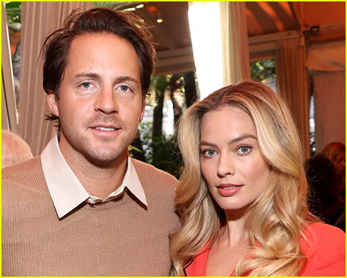 Margot Robbie and husband Tom Ackerley at an event