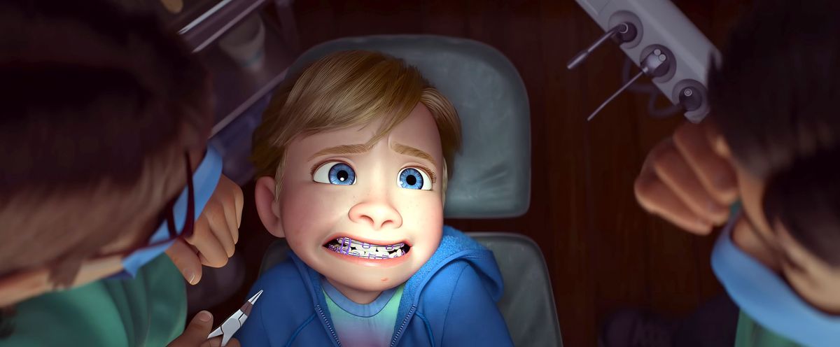 Thirteen-year-old Riley cringes in a dentist’s chair in a scene from Pixar Animation Studios’ Inside Out 2