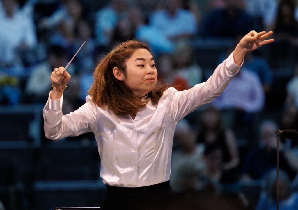 Elim Chan conducts.