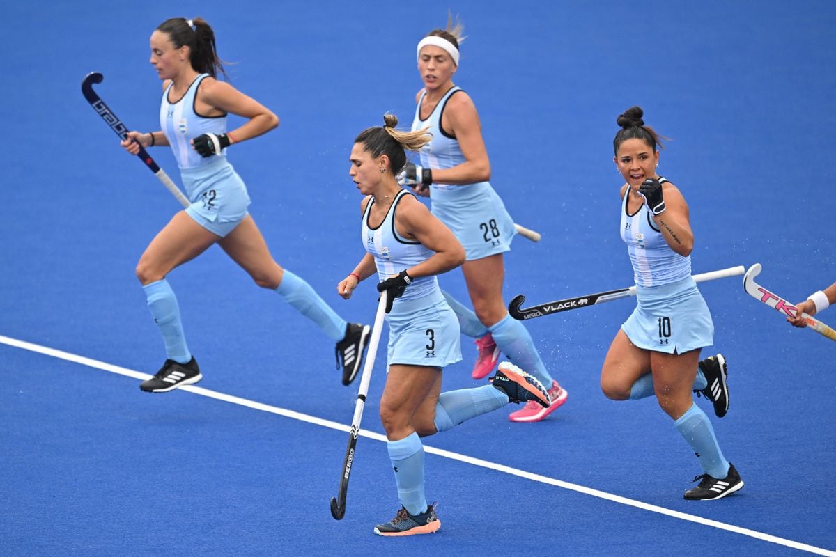 (L-R) Argentina's Eugenia Trinchinetti, Agustina Gorzelany, Julieta Jankunas, and Maria Granatto celebrate after the team scored a goal during a short corner during the field hockey women's team preliminary group A match 4 between USA and Argentina during the Pan American Games Santiago 2023, at the Field Hockey Sports Centre in Santiago on October 28, 2023.