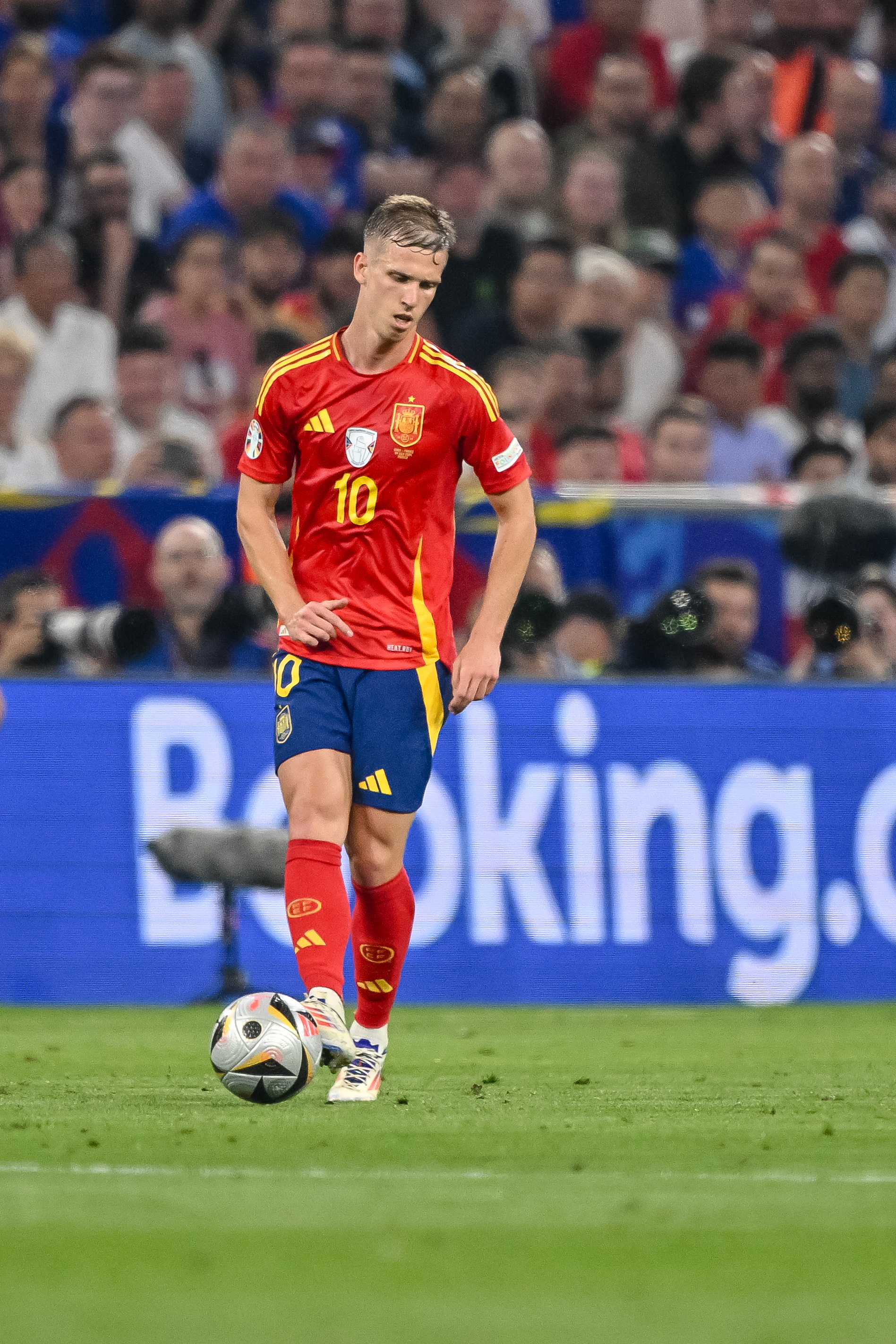 Dani Olmo controlling the ball during the Euro 2024 semi-final against France at Munich Football Arena on July 9, 2024