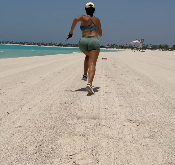 But Georgina also found some time to enjoy a run on the sand