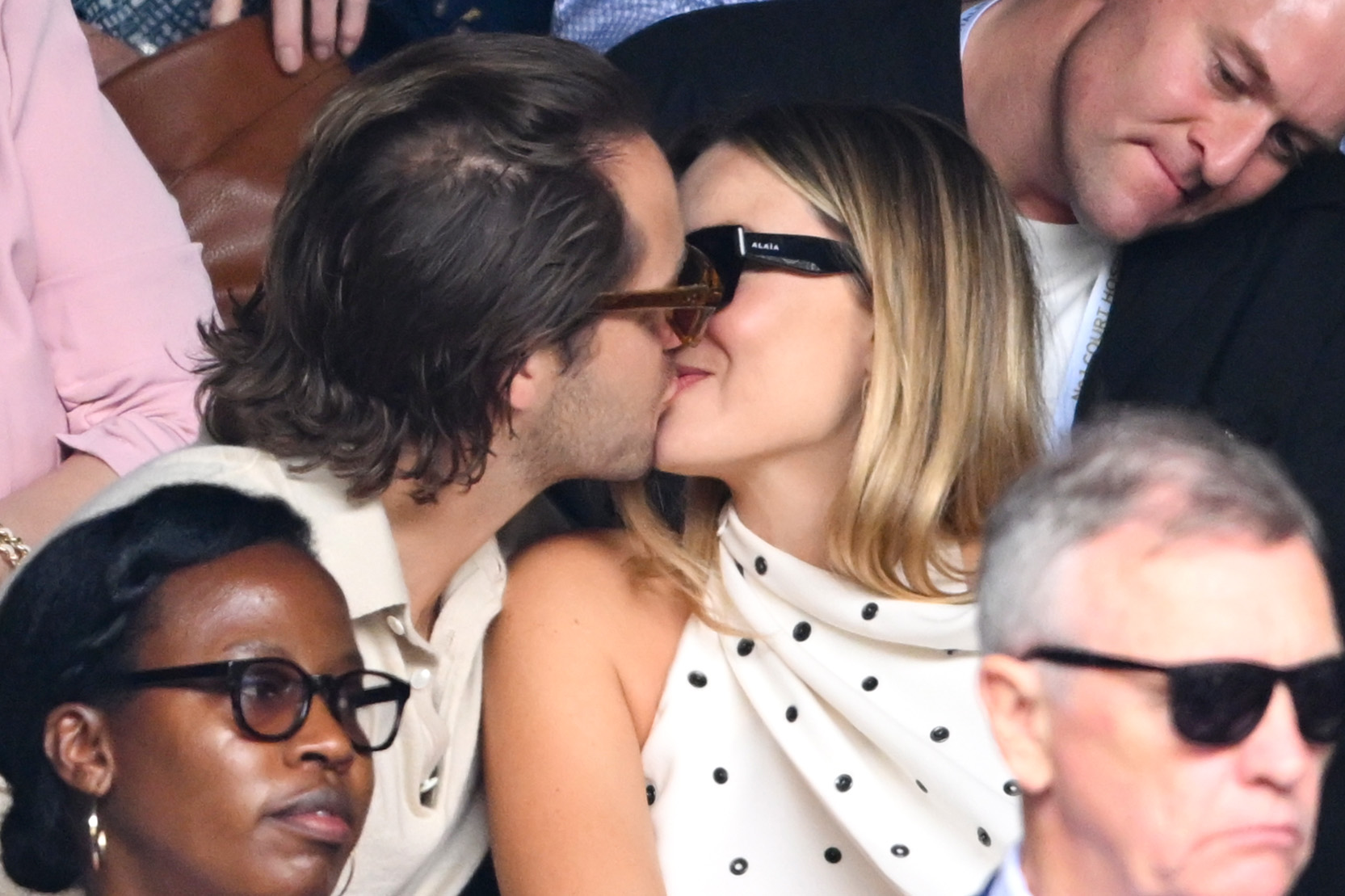 Margot and her husband Tom enjoyed a kiss