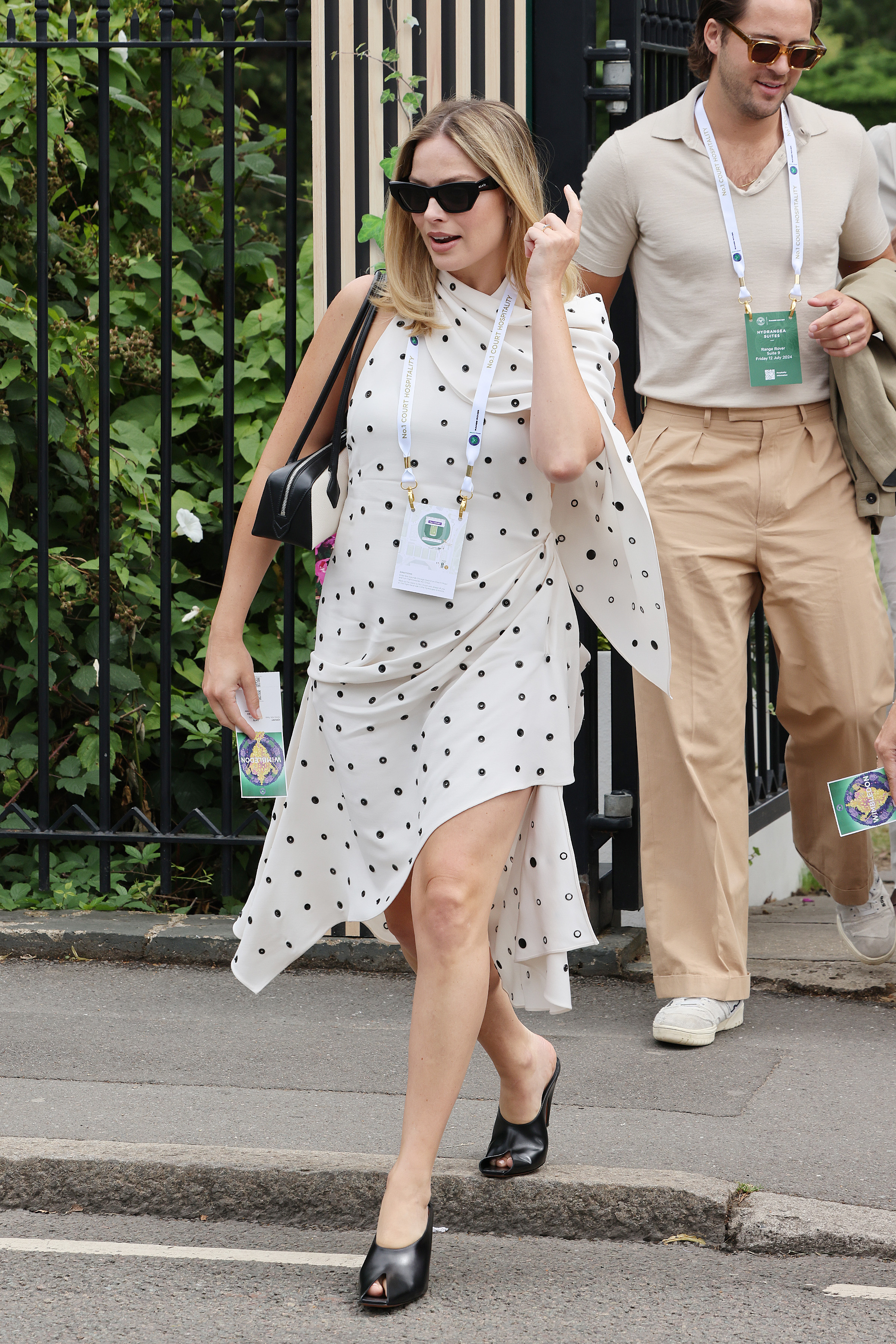 The Barbie star wore a chic black and white polka dot dress at Wimbledon