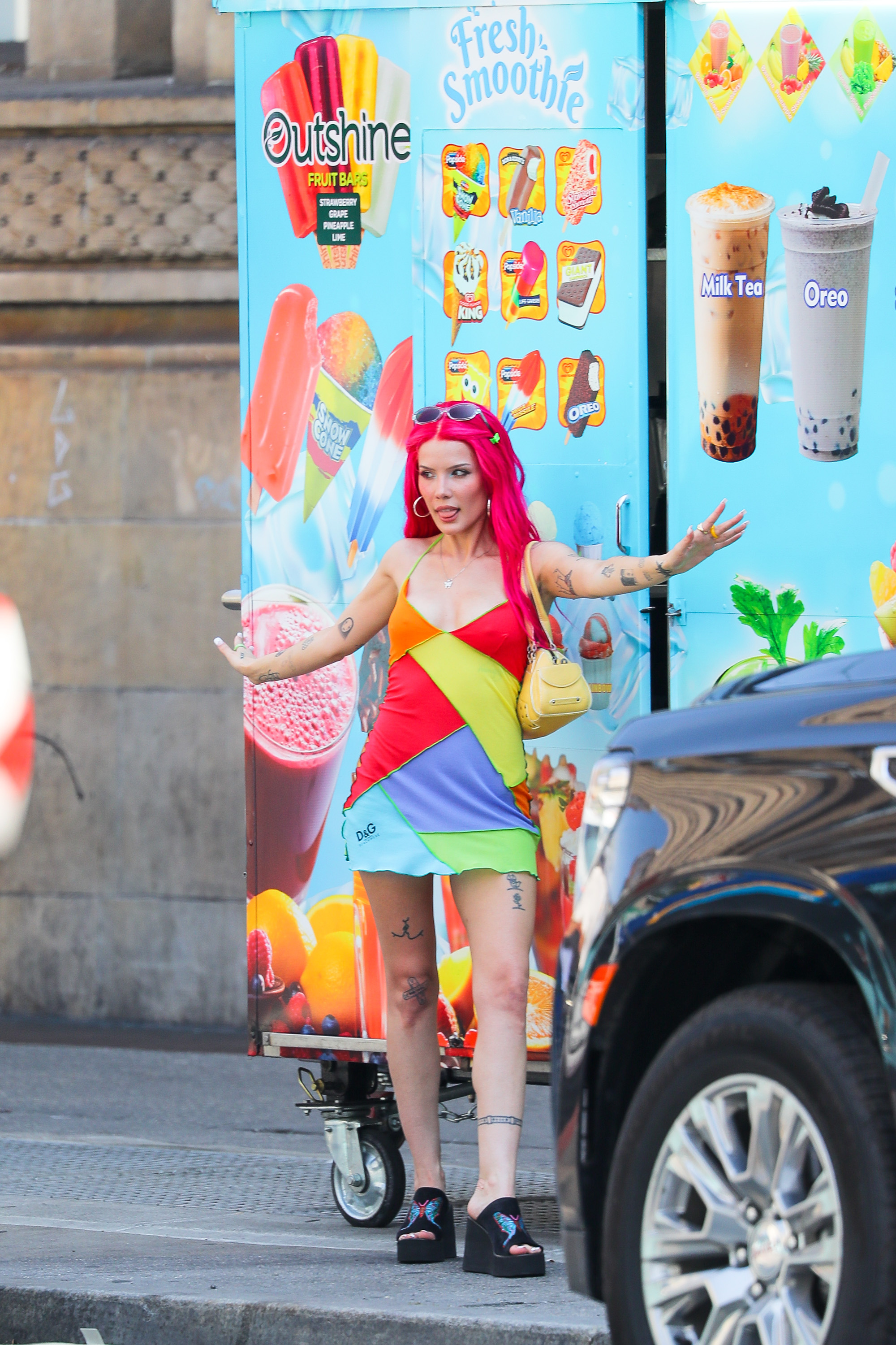 Halsey was seen taking a photo in front of an ice cream truck as she showed off her long pink hair