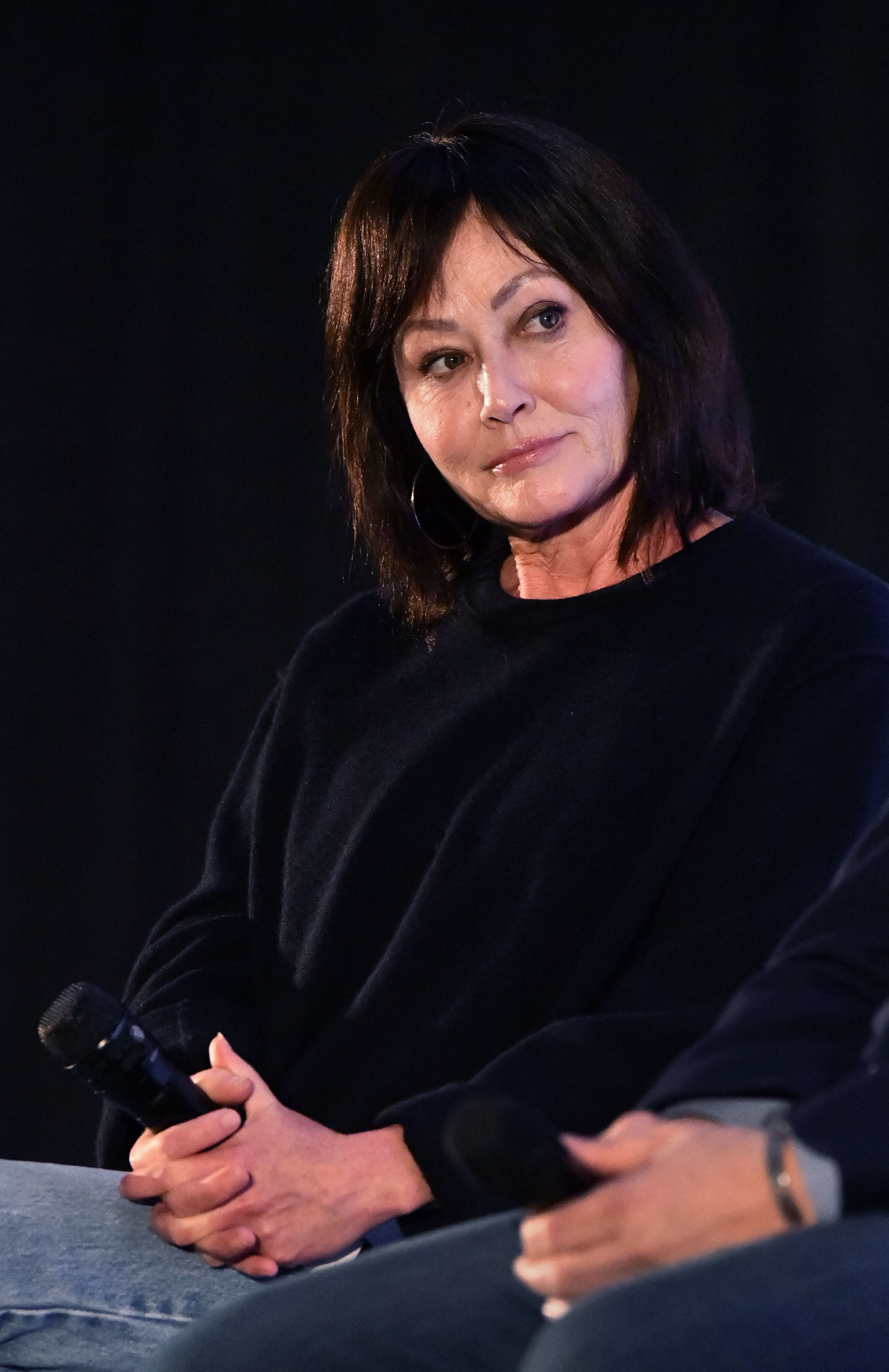 Shannen Doherty speaks during a Q&A session at MegaCon Orlando in February 2024