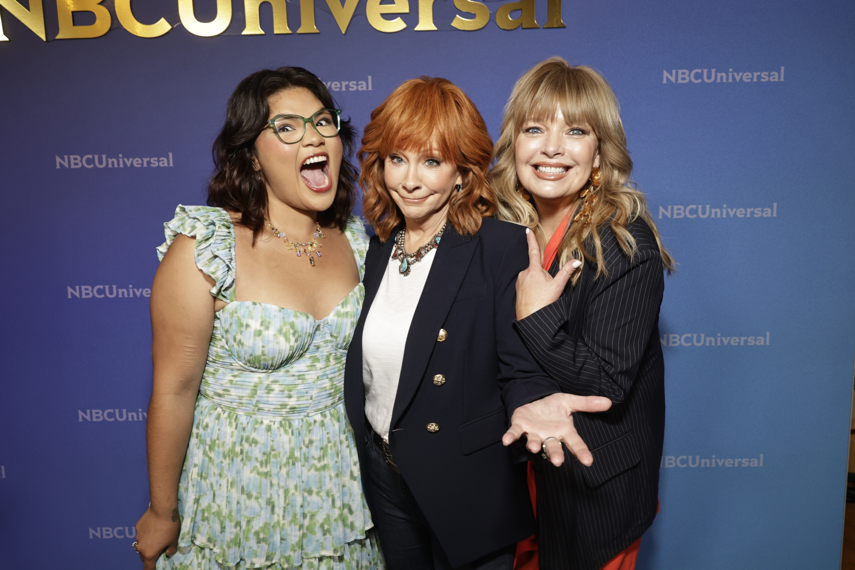 Belissa Escobedo, Reba McEntire, and Melissa Peterman, seen at the 2024 NBCUniversal Summer Press Tour, are set to star in Happy's Place