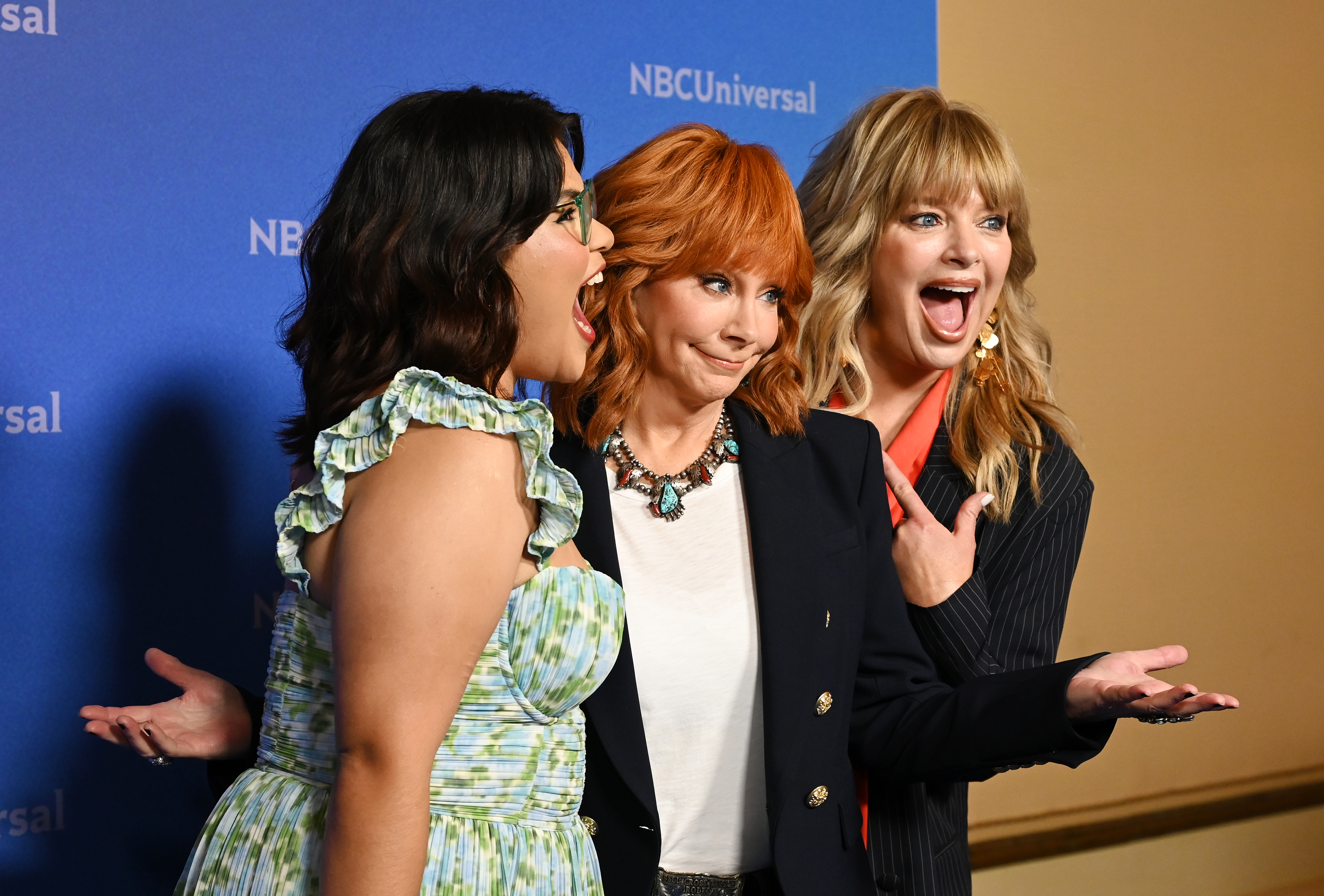 Belissa Escobedo, Reba McEntire and Melissa Peterman, pictured during the NBCUniversal Summer Press Tour, will appear in the show set around a bar