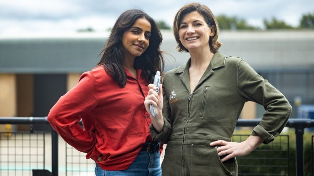 Mandip Gill and Jodie Whittaker stand together in doctor who thirteenth doctor big finish audio announcement