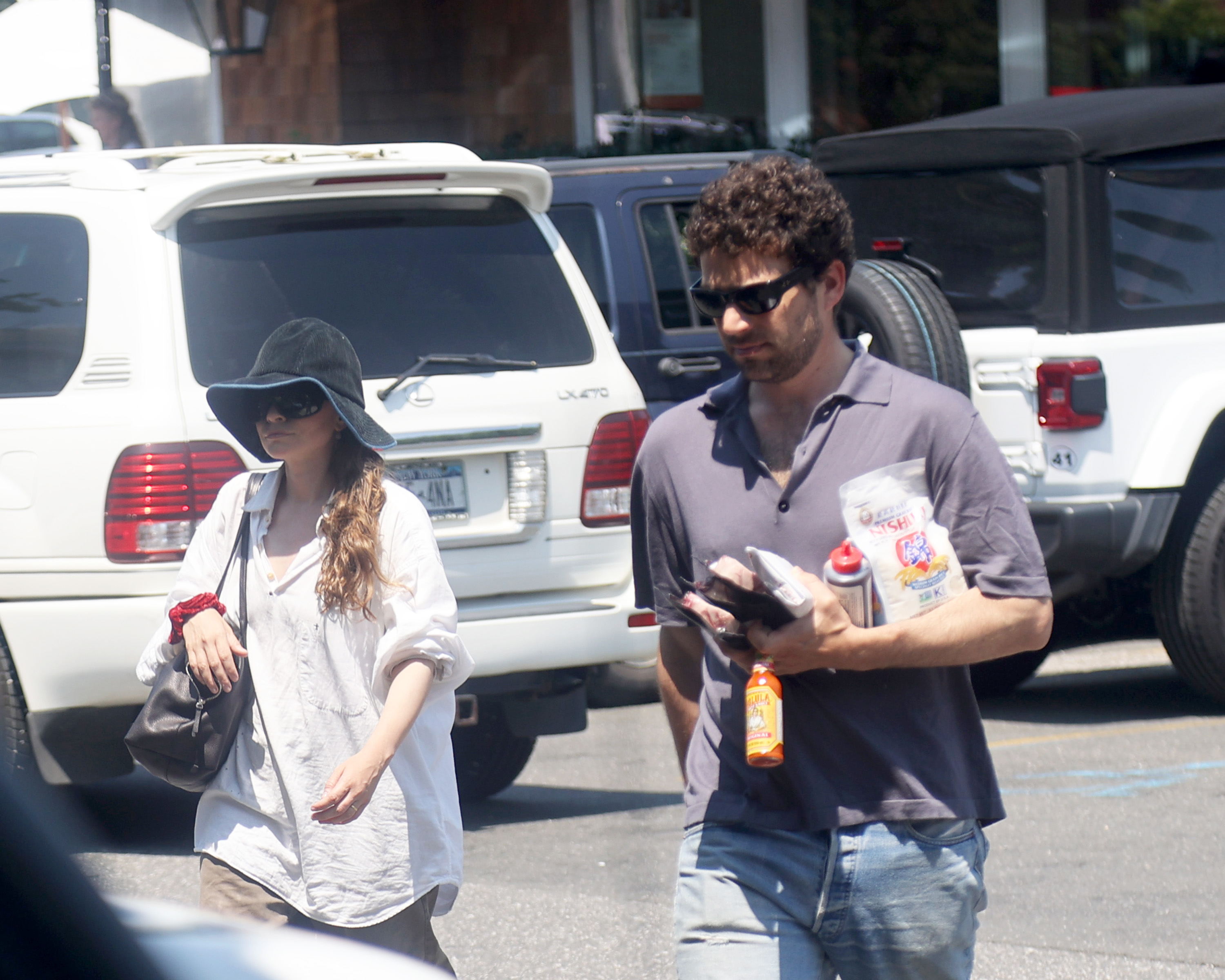 While in The Hamptons, Ashley Olsen and her husband Louis Eisner were spotted grabbing breakfast