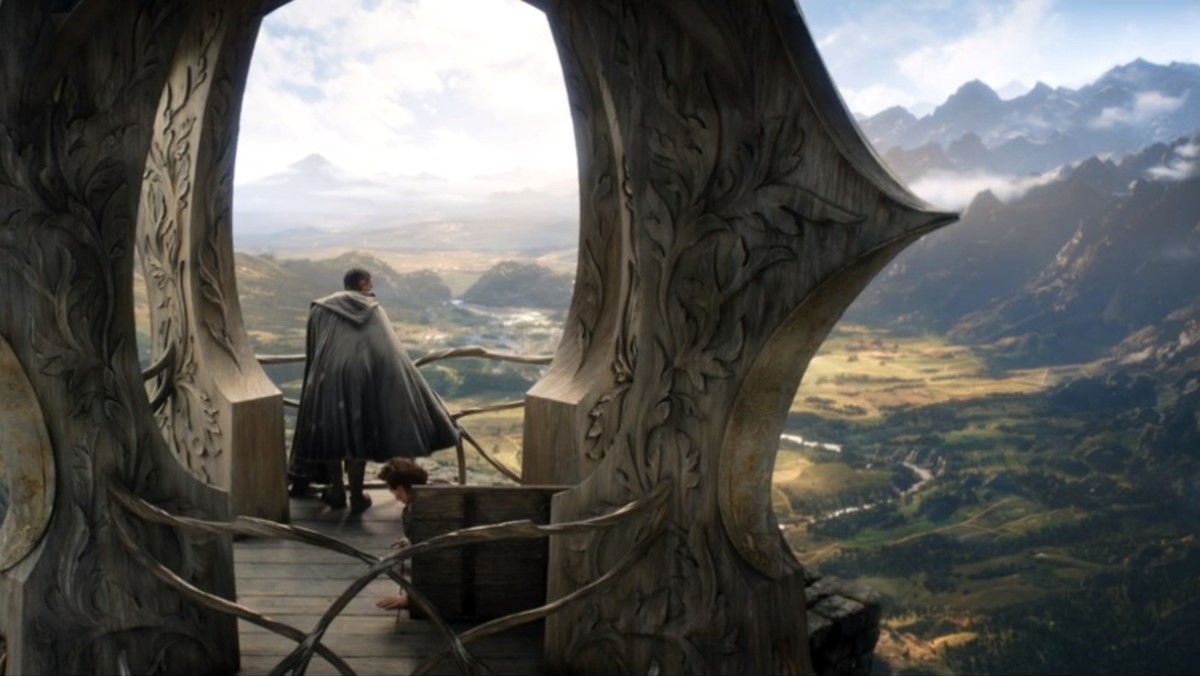 An elf stands on a tower overlooking a great vista in The Rings of Power