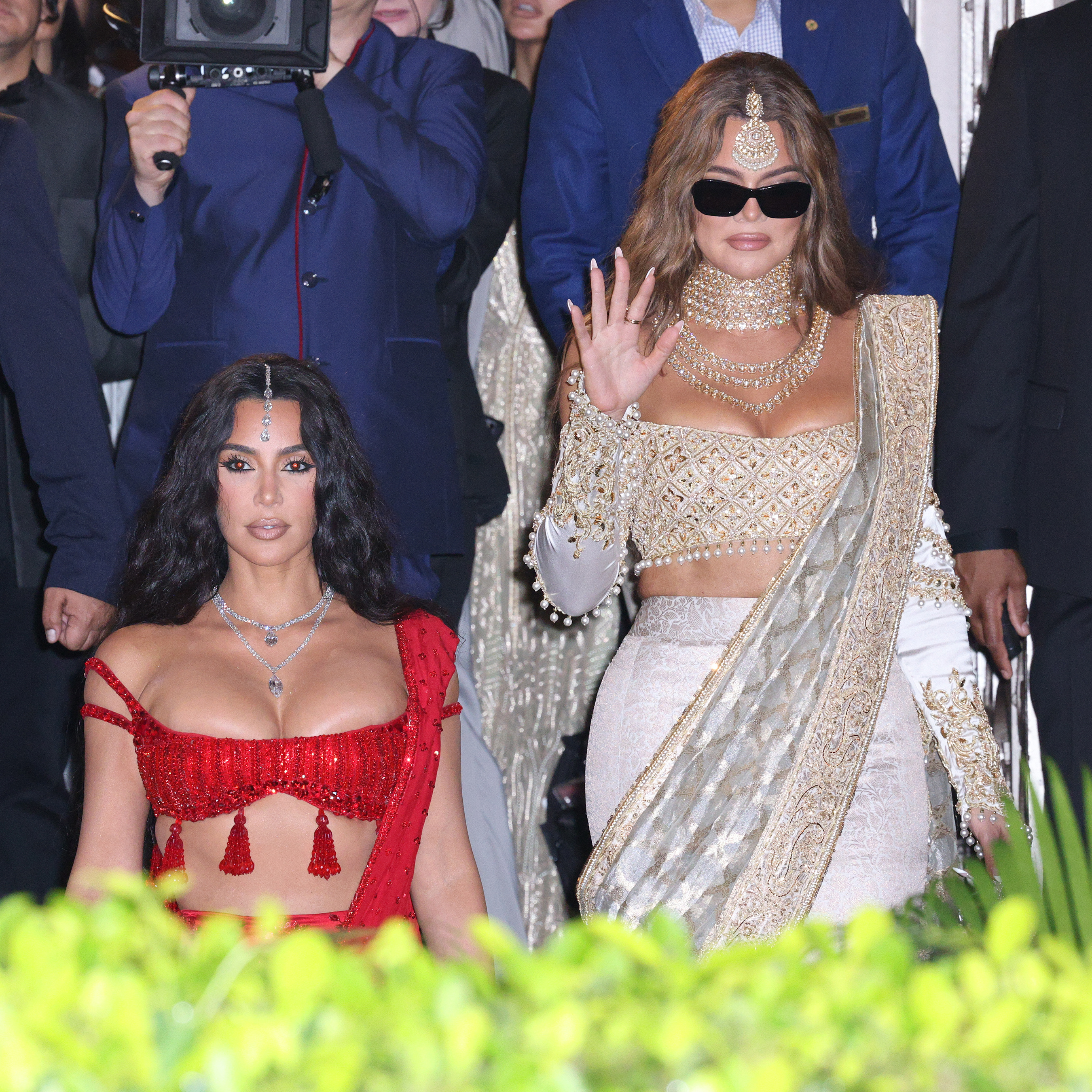 Kim Kardashian and Khloé Kardashian leaving their hotel in Mumbai to attend the wedding of Anant Ambani and Radhika Merchant