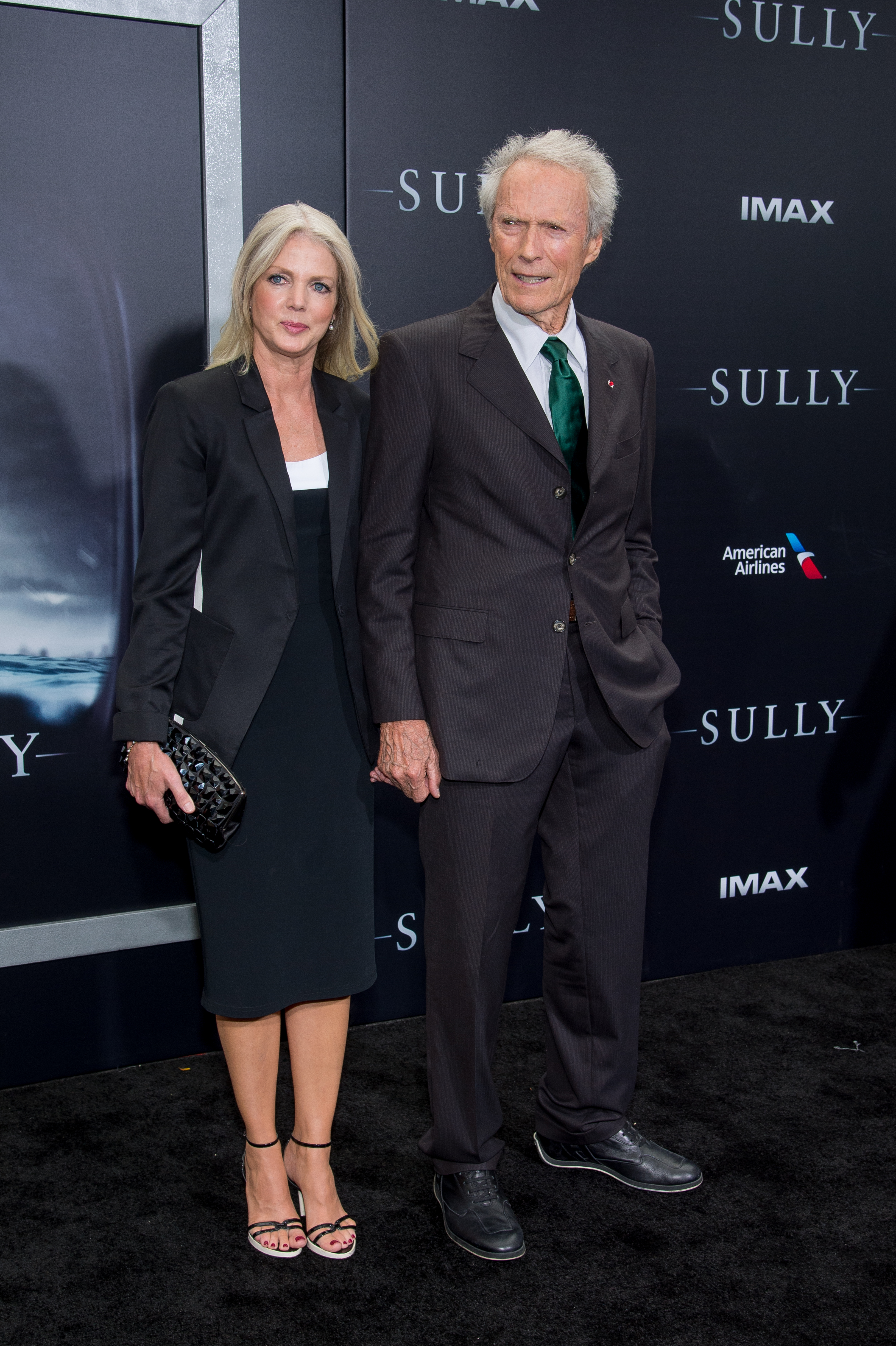 Christina Sandera and Clint Eastwood attend the Sully New York premiere