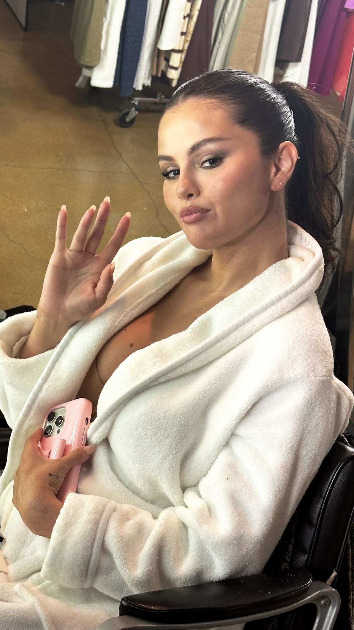 Selena Gomez suffered a small wardrobe malfunction after her white robe showed off a little more cleavage than intended
