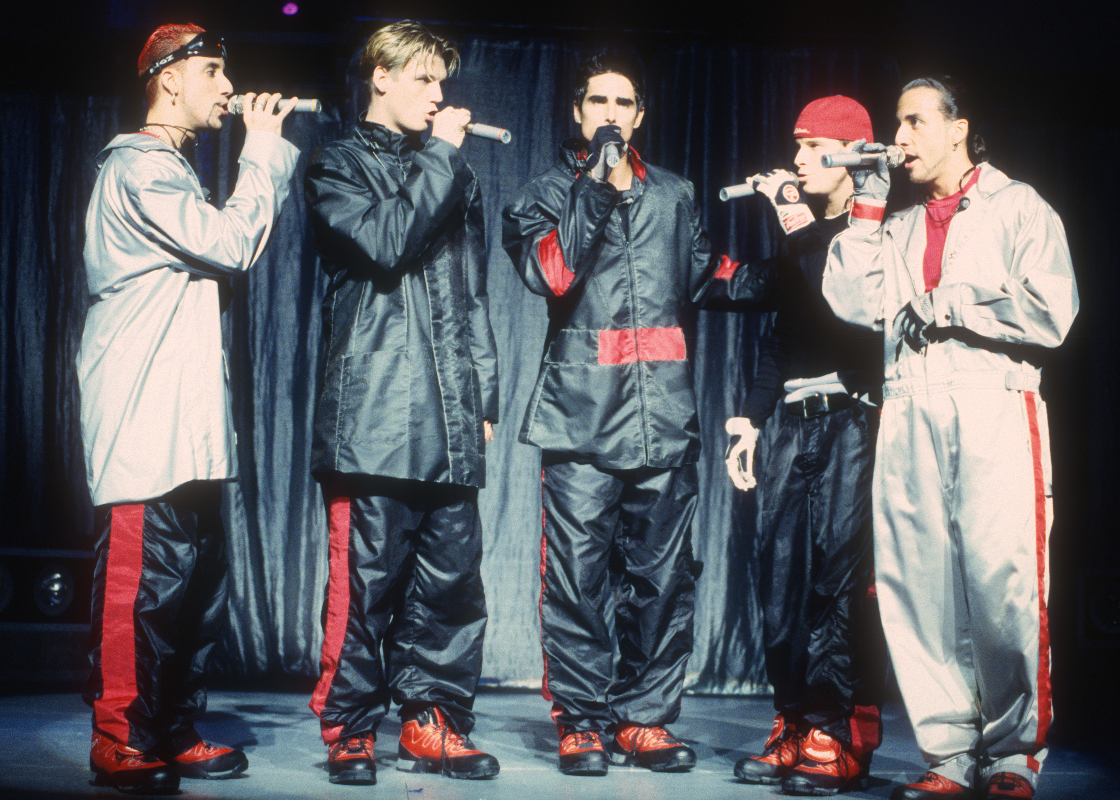 AJ McLean, Nick Carter, Kevin Richardson, Brian Littrell, and Howie Dorough performing at the Universal Amphitheatre in Los Angeles, California on August 8, 1998