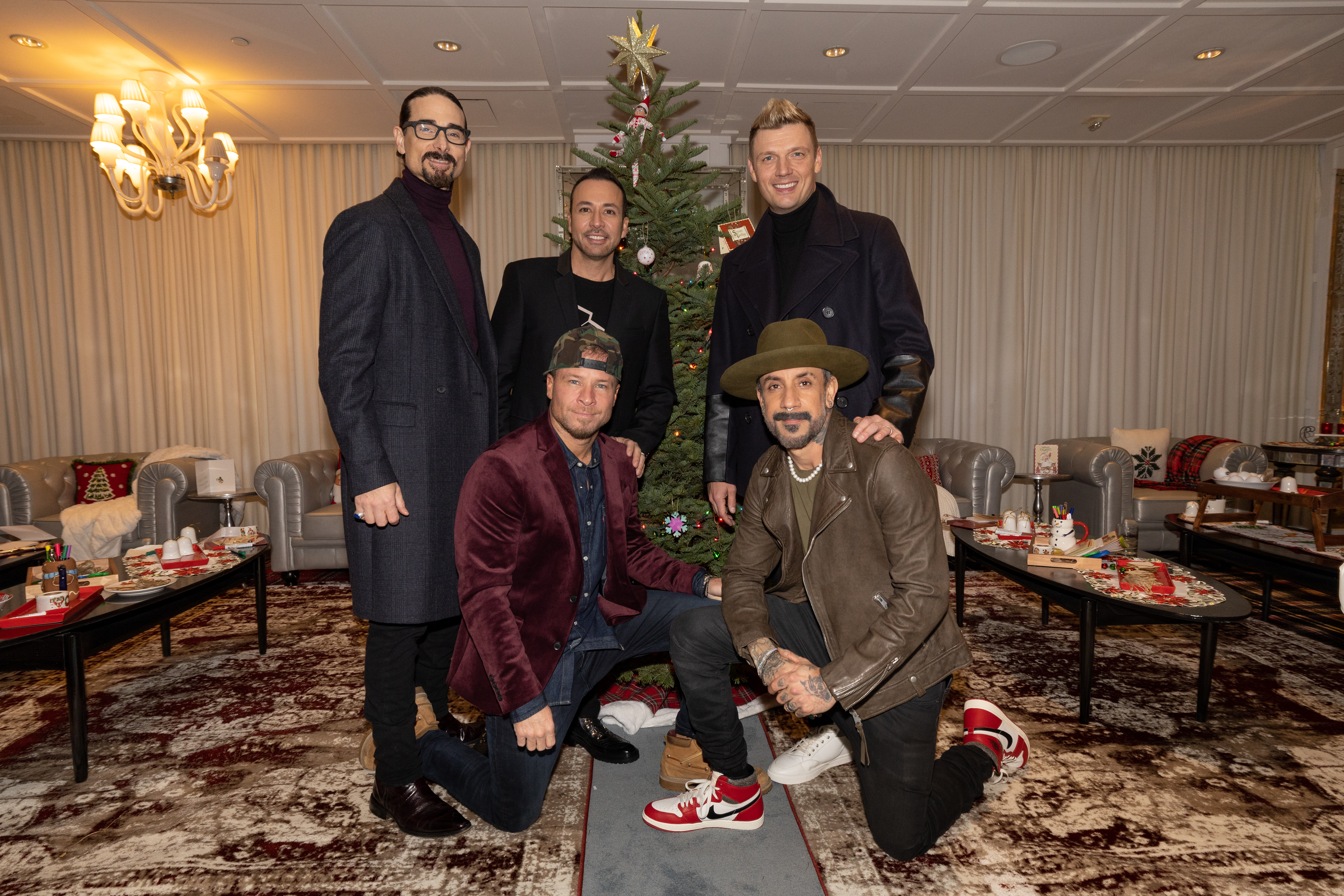 Kevin Richardson, Howie Dorough, Nick Carter, Brian Littrell, and AJ McLean of the Backstreet Boys promoting their 2022 Christmas album
