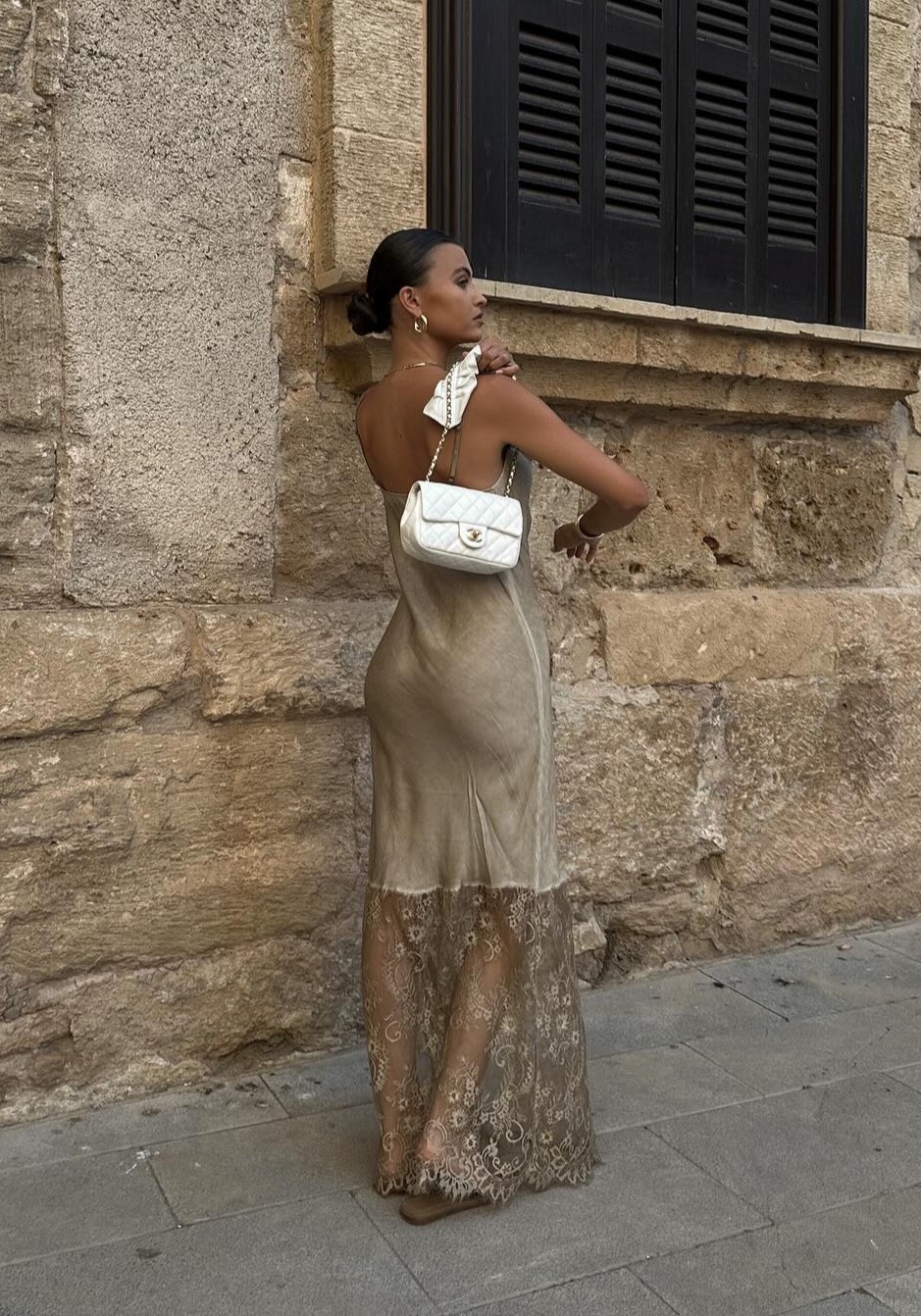 She's regularly spotted wearing designer handbags like her classic Chanel mini and Fendi baguette bag