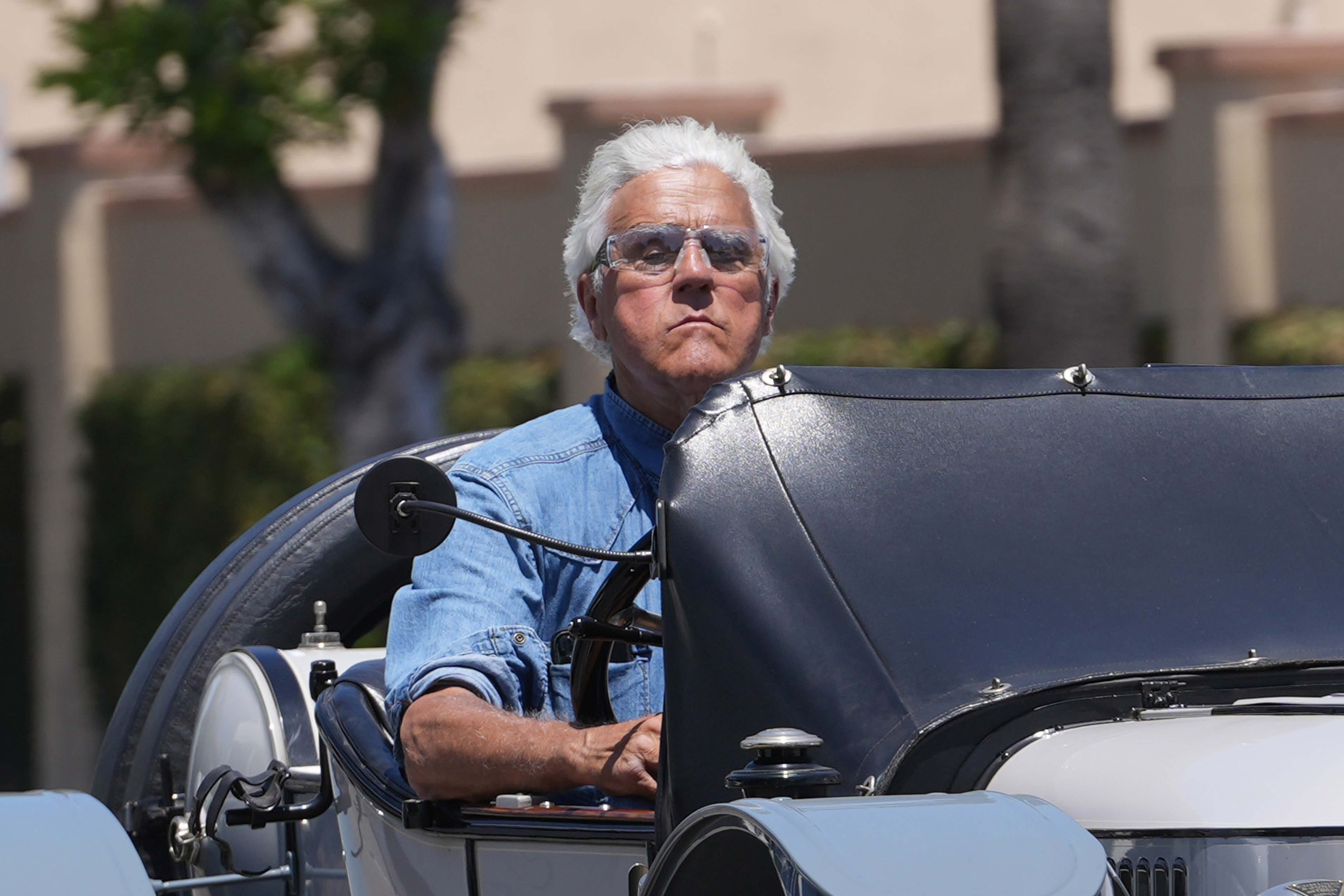 Jay Leno, seen riding in his Stanley Roadster in Los Angeles, has an impressive car collection