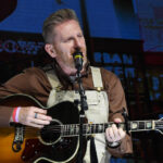 Rory Feek performing at the National Finals Rodeo's Cowboy Christmas in Las Vegas in December 2019