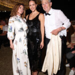 Shania Twain, with Katharine McPhee, and David Foster, at The Fab Thirties Event on July 21, 2024, in Italy, wore a modest white dress with flowers