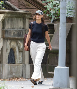 Katie Holmes, seen strolling through New York City, has left fans concerned after spotting a large bruise on her face