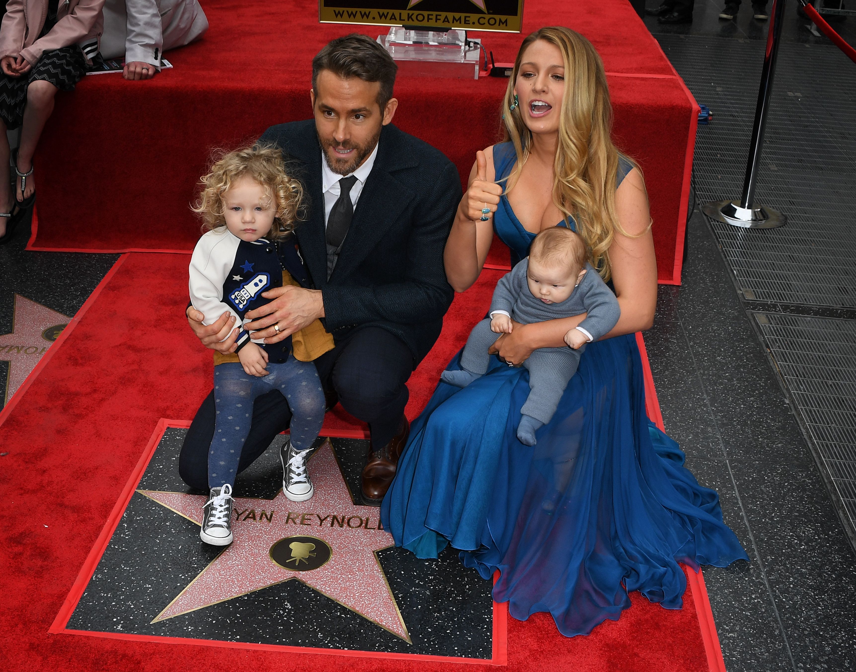 Ryan Reynolds and wife Blake Lively pose with their daughters