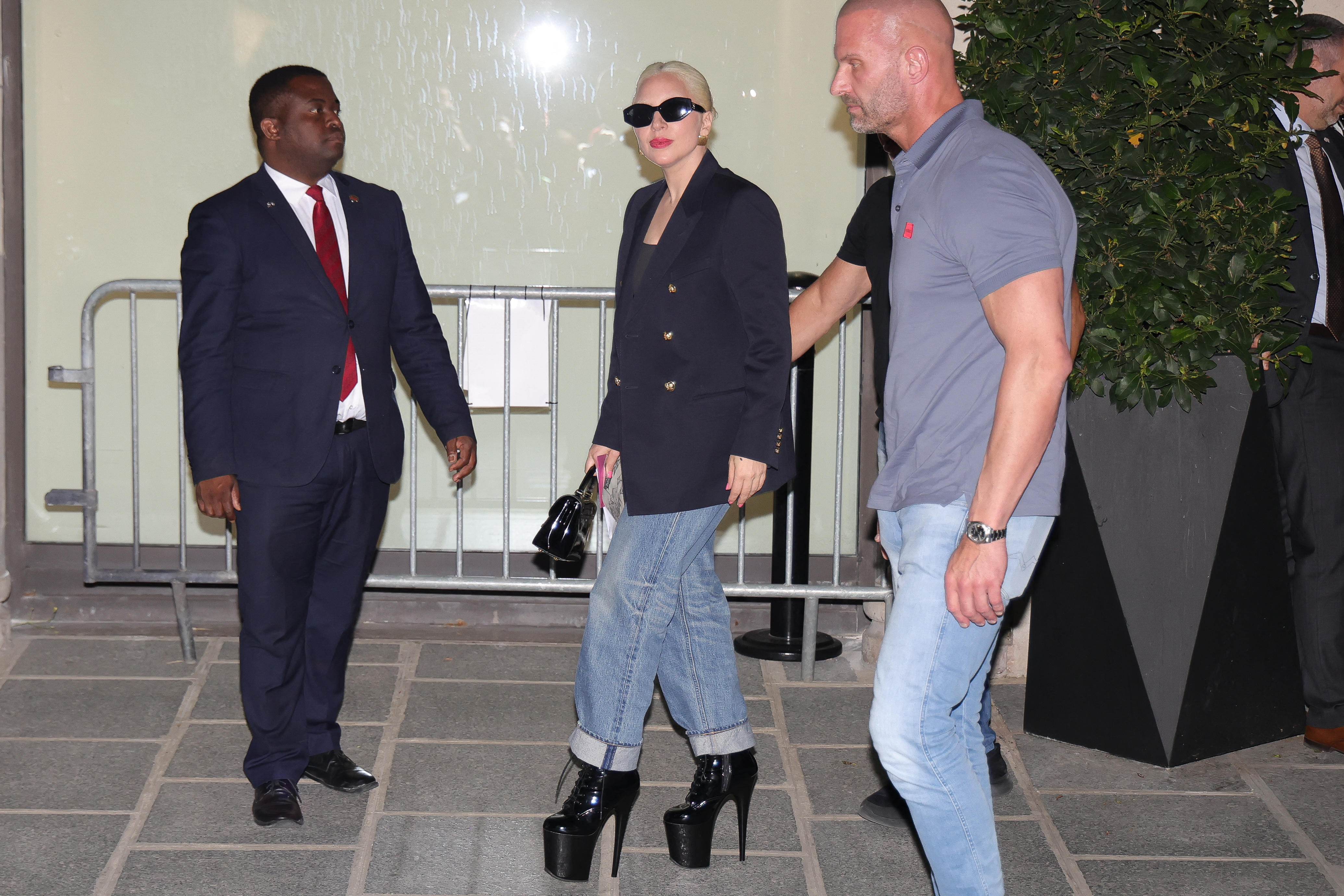 Lady Gaga, pictured outside her Paris hotel, was rumored to be performing with Celine Dion (not pictured)
