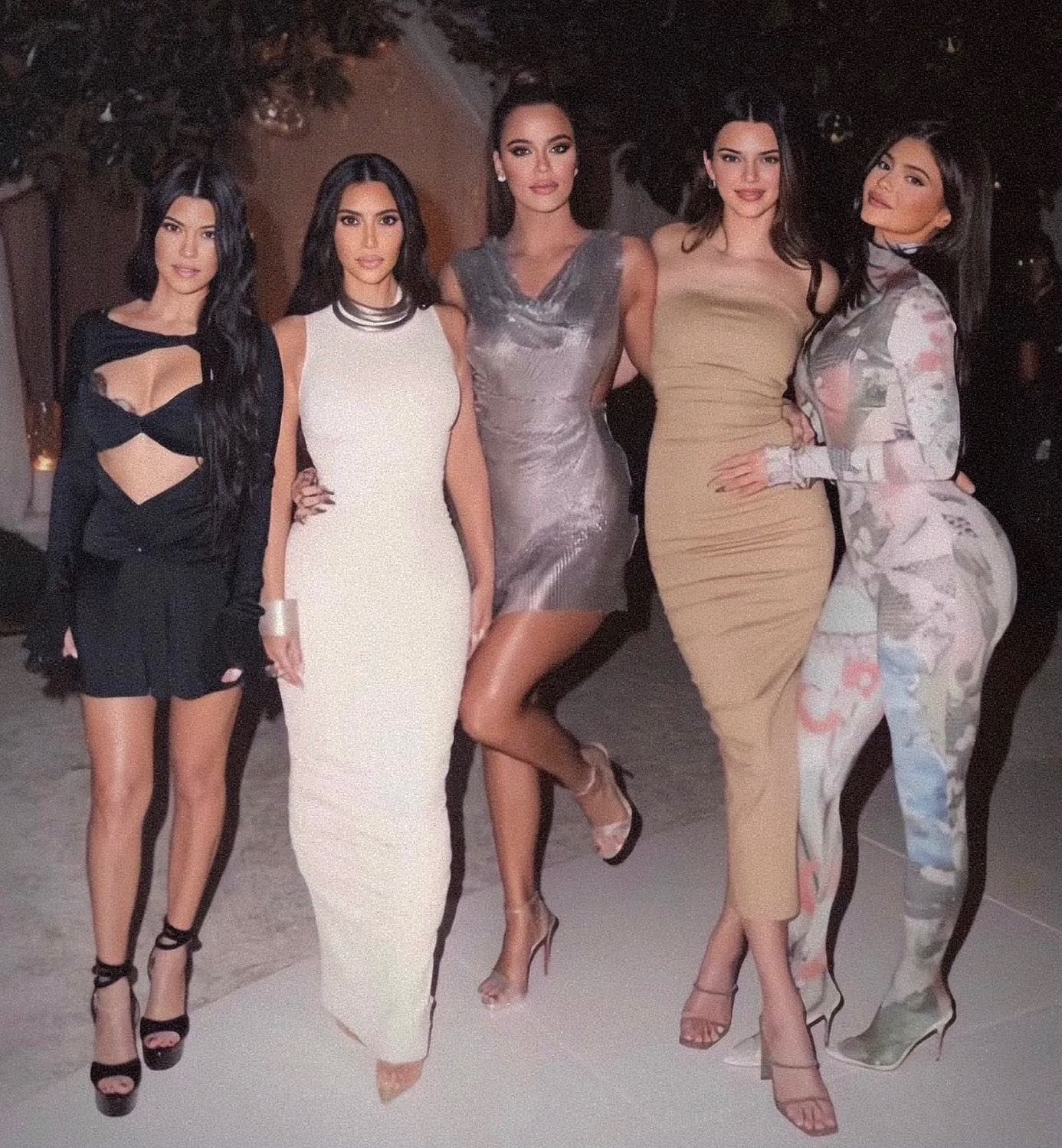Kardashians Kourtney, Kim, Khloé, and Kendall and Kylie Jenner gathering for a group photo