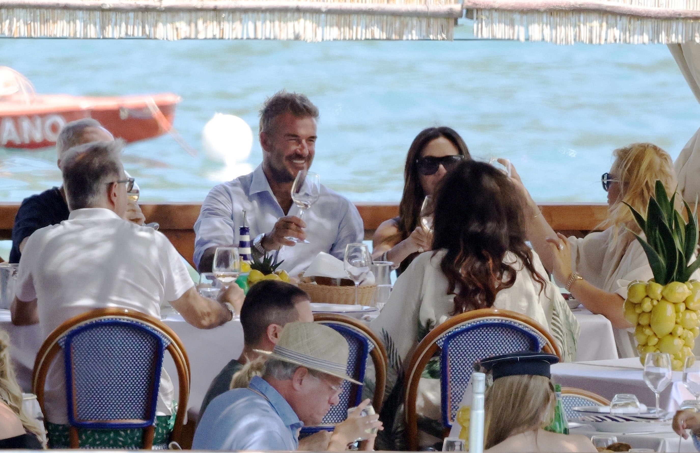 Becks and Posh Spice packed on the PDA at the table before retreating back to their yacht