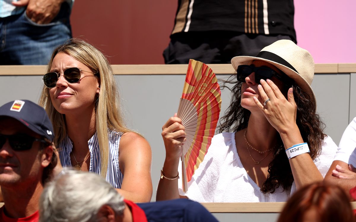 María Isabel Nadal and Maria Francisca Perello support Rafael Nadal against Novak Djokovic of Team Serbia during the Men's Singles second-round match on day three of the Olympic Games 