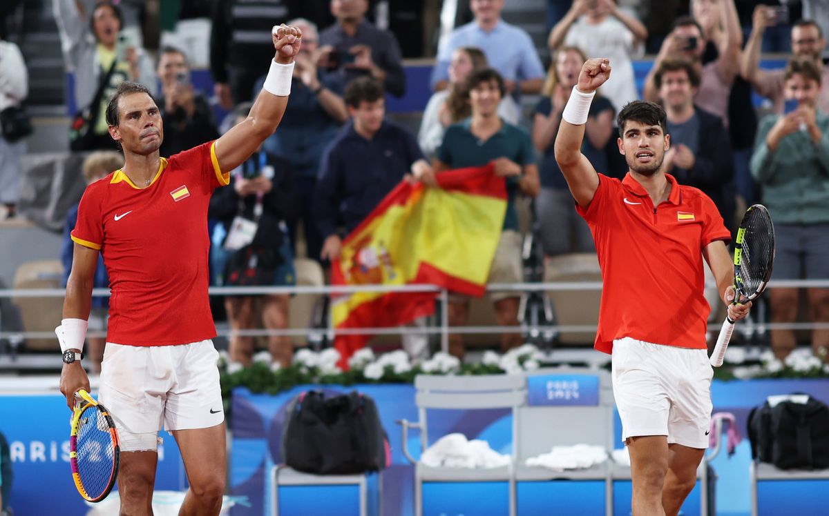 Rafael Nadal and partner Carlos Alcaraz celebrate victory against Andres Molteni and Maximo Gonzalez of Team Argentina