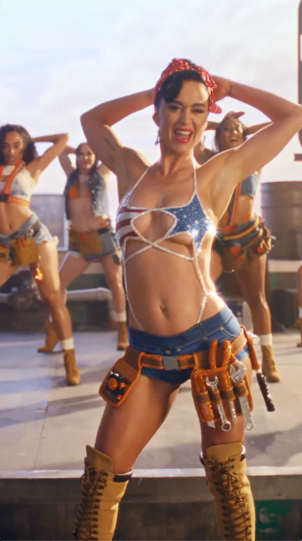 Katy Perry dressed as a construction worker in her music video for her newest single, Woman's World